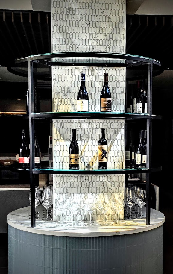Restaurant wine showcase fabricated with integrated steel and wood